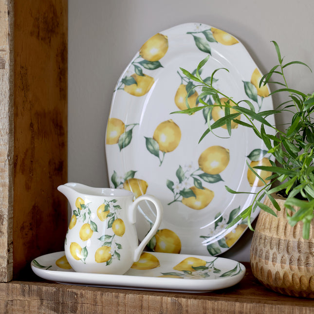 Lite fat eller tallerken i porselen med sitroner