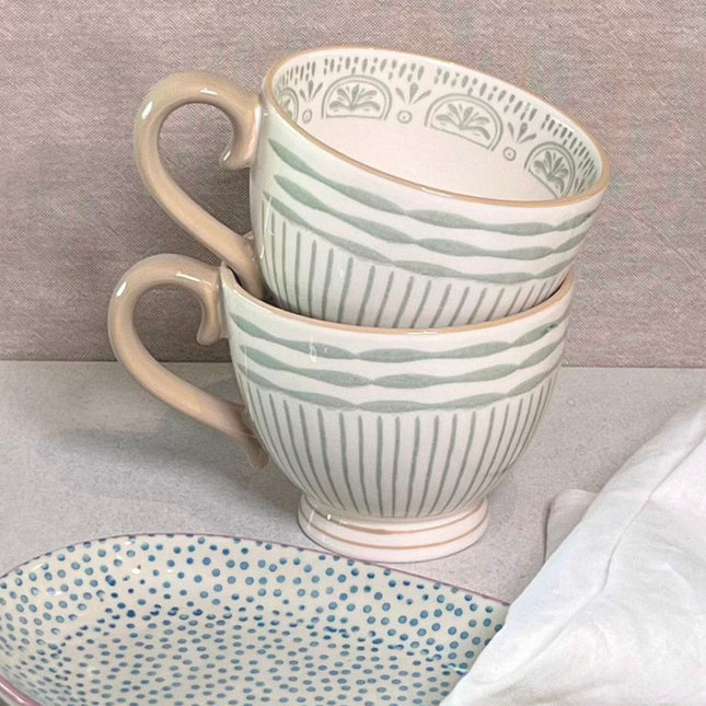 Maple kaffe- og tekopp med mønster i grønt